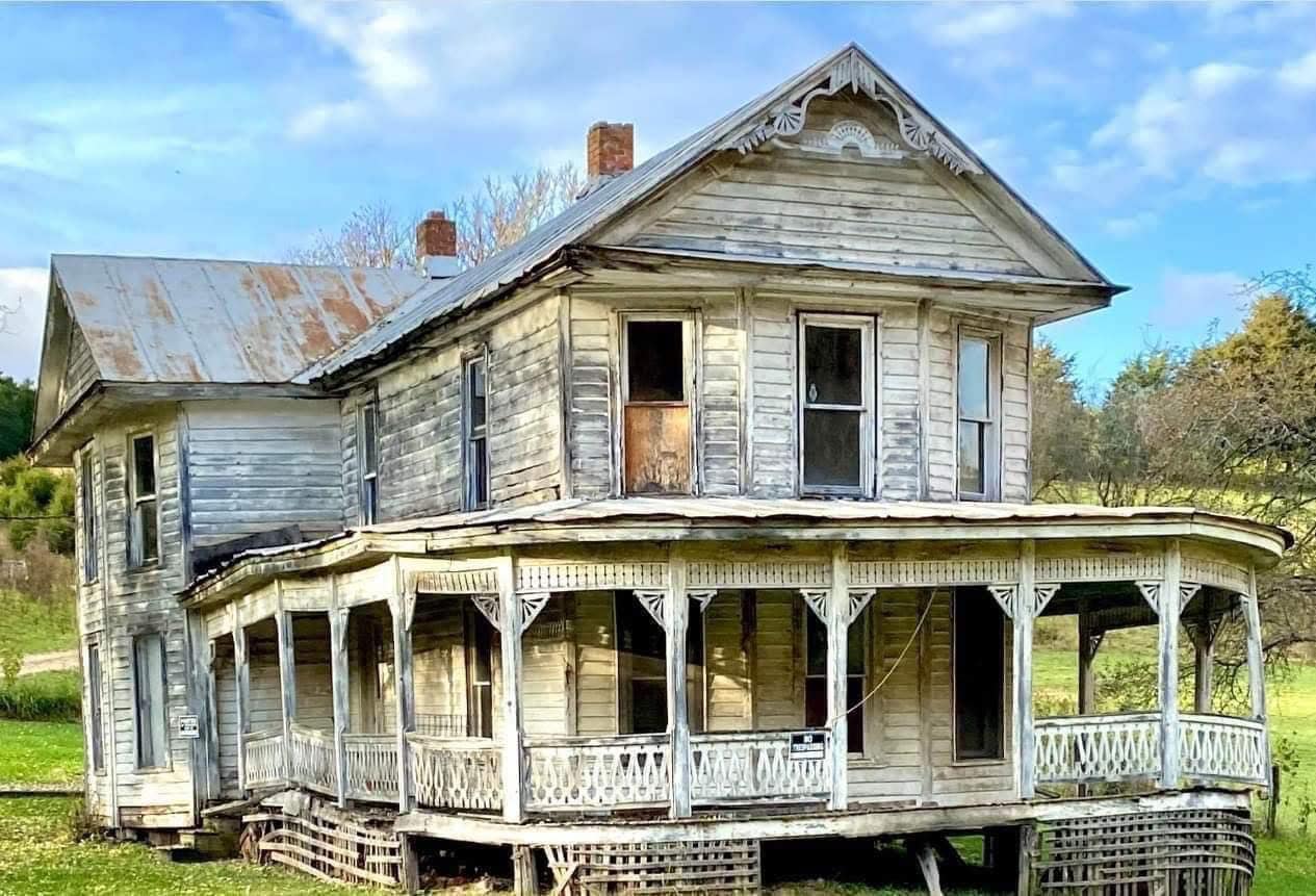 This house looked like it was about to fall into itself until one family stepped in